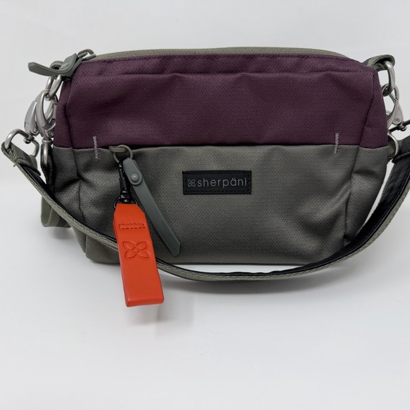 Sherpani Greenish Gray Purple Colorblock Crossbody Bag Logo Zipper Bag Charm - Picture 10 of 12